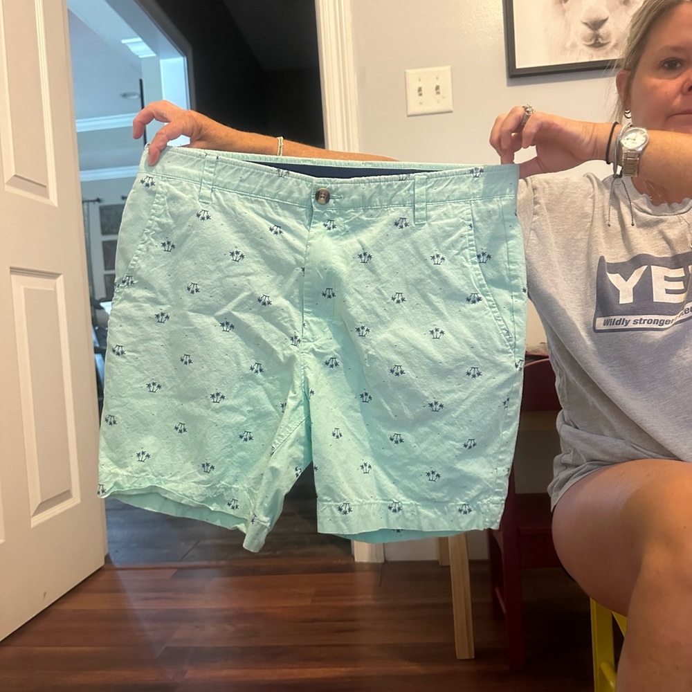 Blue shorts with palm trees